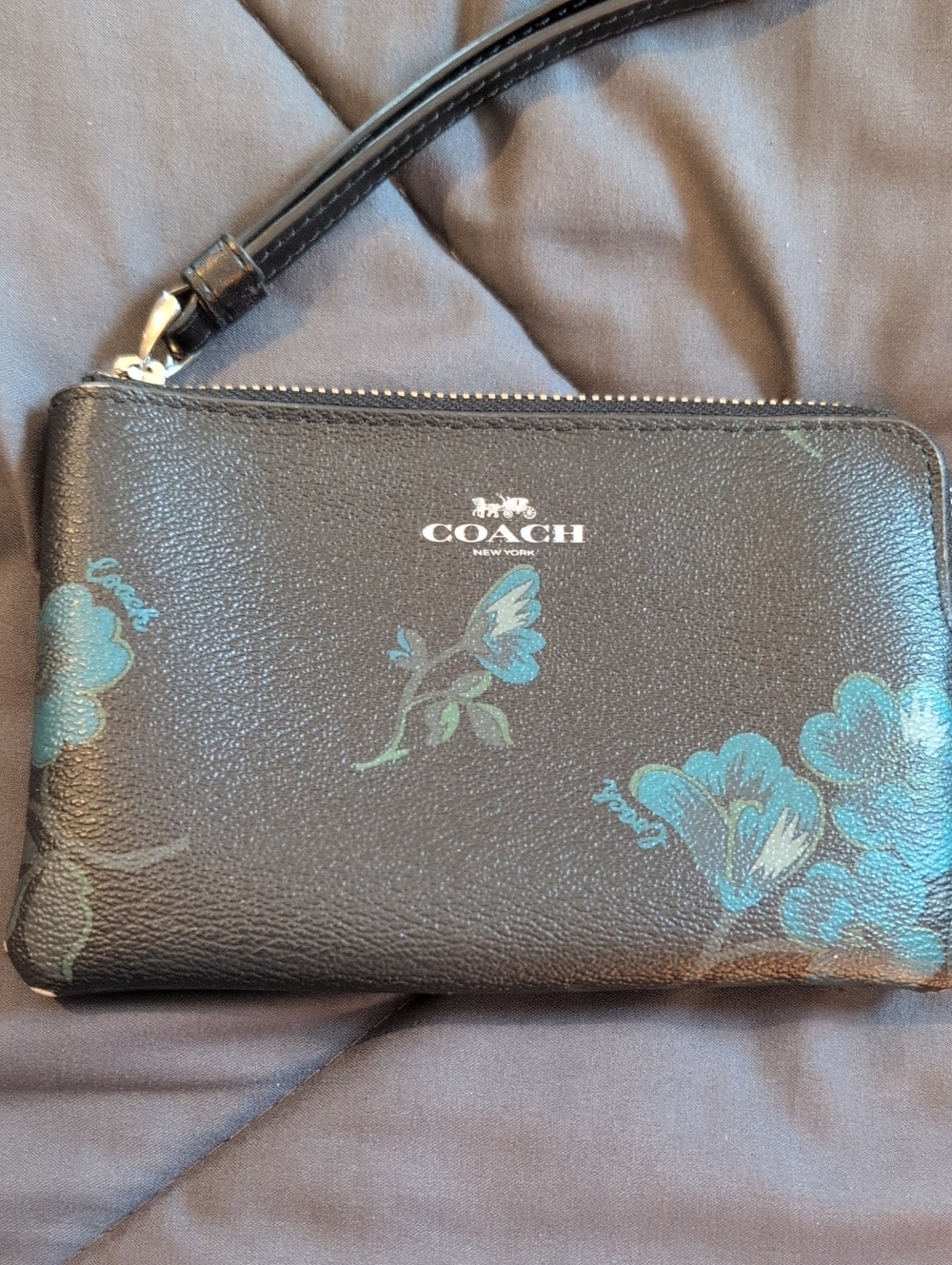 COACH Black Wristlet with Blue Floral Print